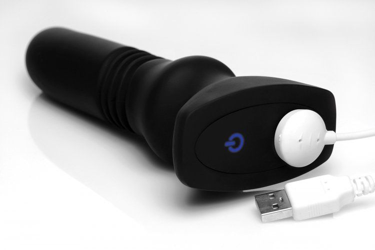 Черный фрикционный вибратор Silicone Vibrating & Thrusting Plug with Remote Control - 17,1 см.