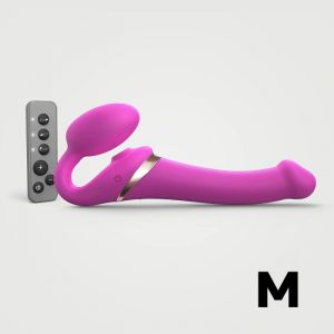 Ярко-розовый безремневой страпон Multi Orgasm Size M с клиторальной стимуляцией