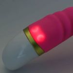 Розовый рельефный вибратор для точки G - 19 см.