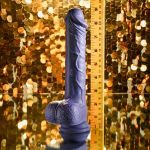 Фиолетовый вибратор на присоске с поступательными движениями Pleasure Rider - 22,2 см.